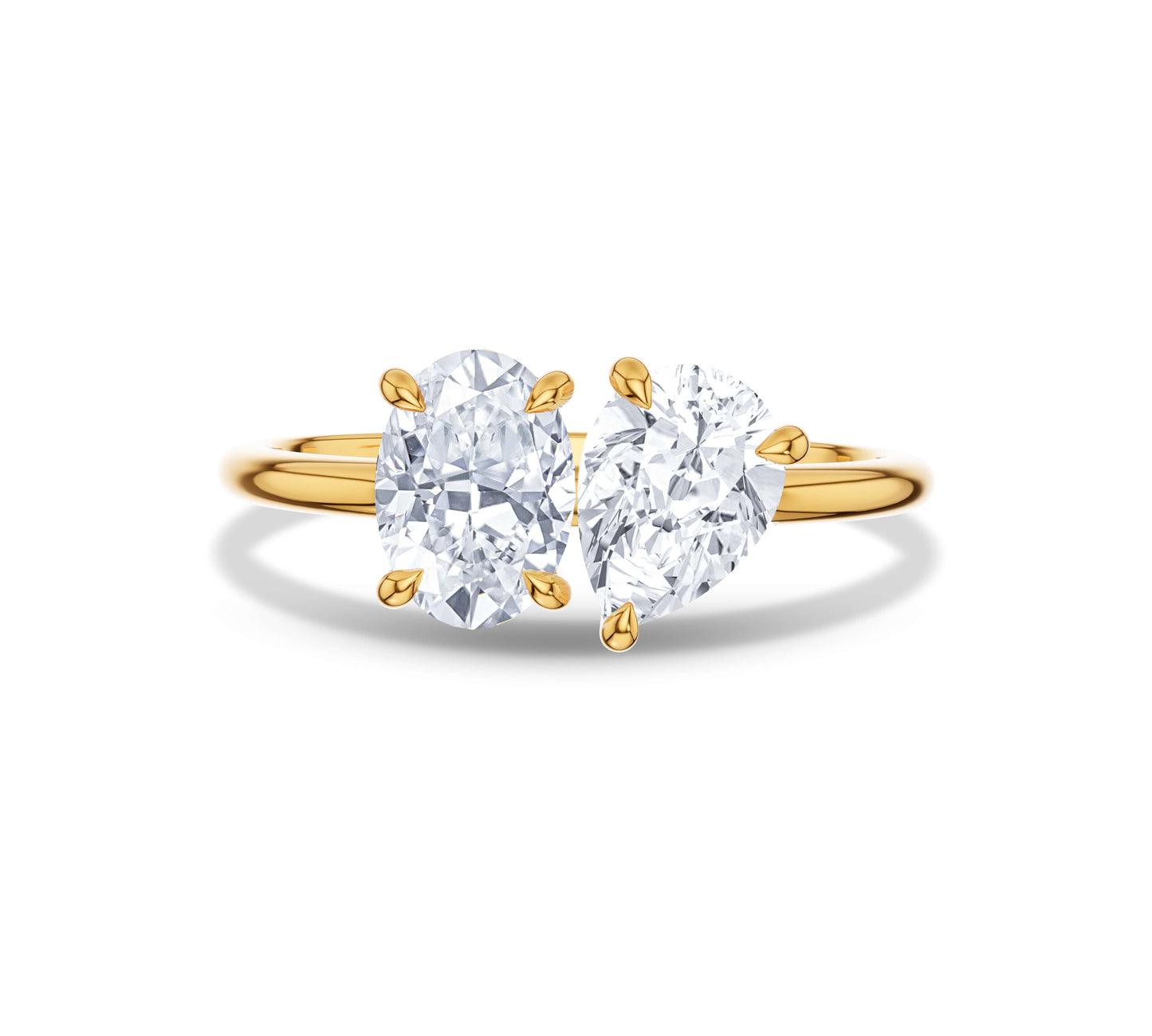 Classic yellow gold Toi et Moi ring with oval and pear cuts
