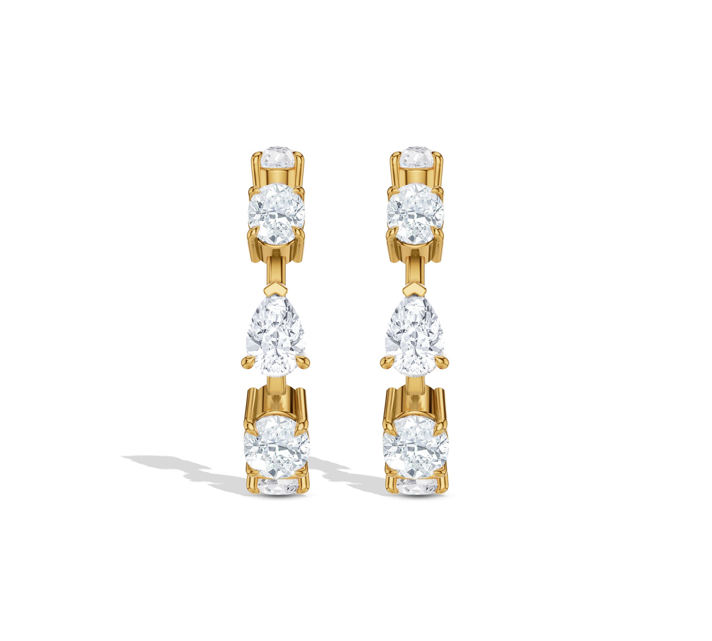 Hoop earrings featuring pear and oval diamonds