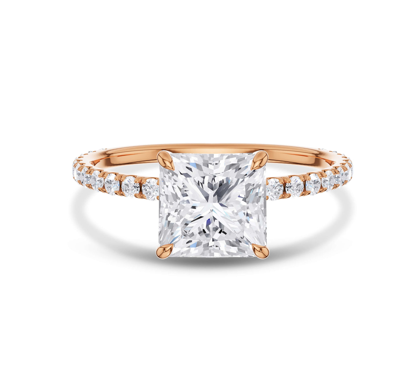 Rose gold pear cut diamond ring with pavé side stones