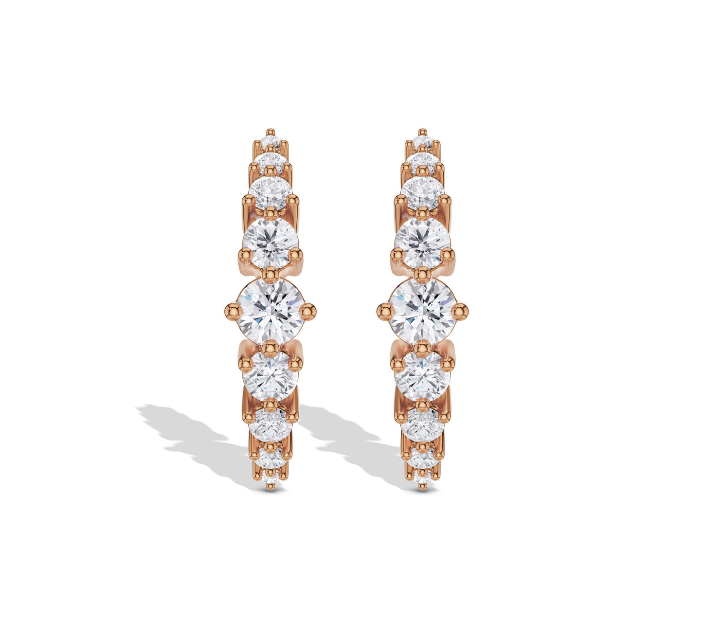 Rose gold huggie hoop earrings with round diamonds