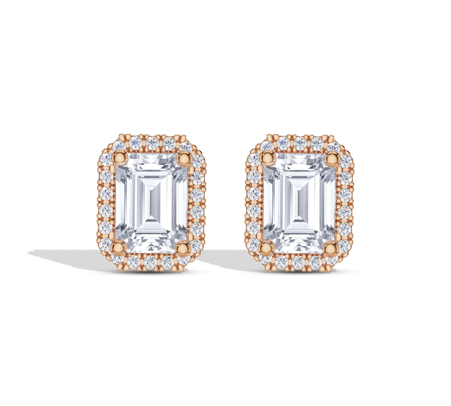 Vintage-inspired emerald diamond stud earrings