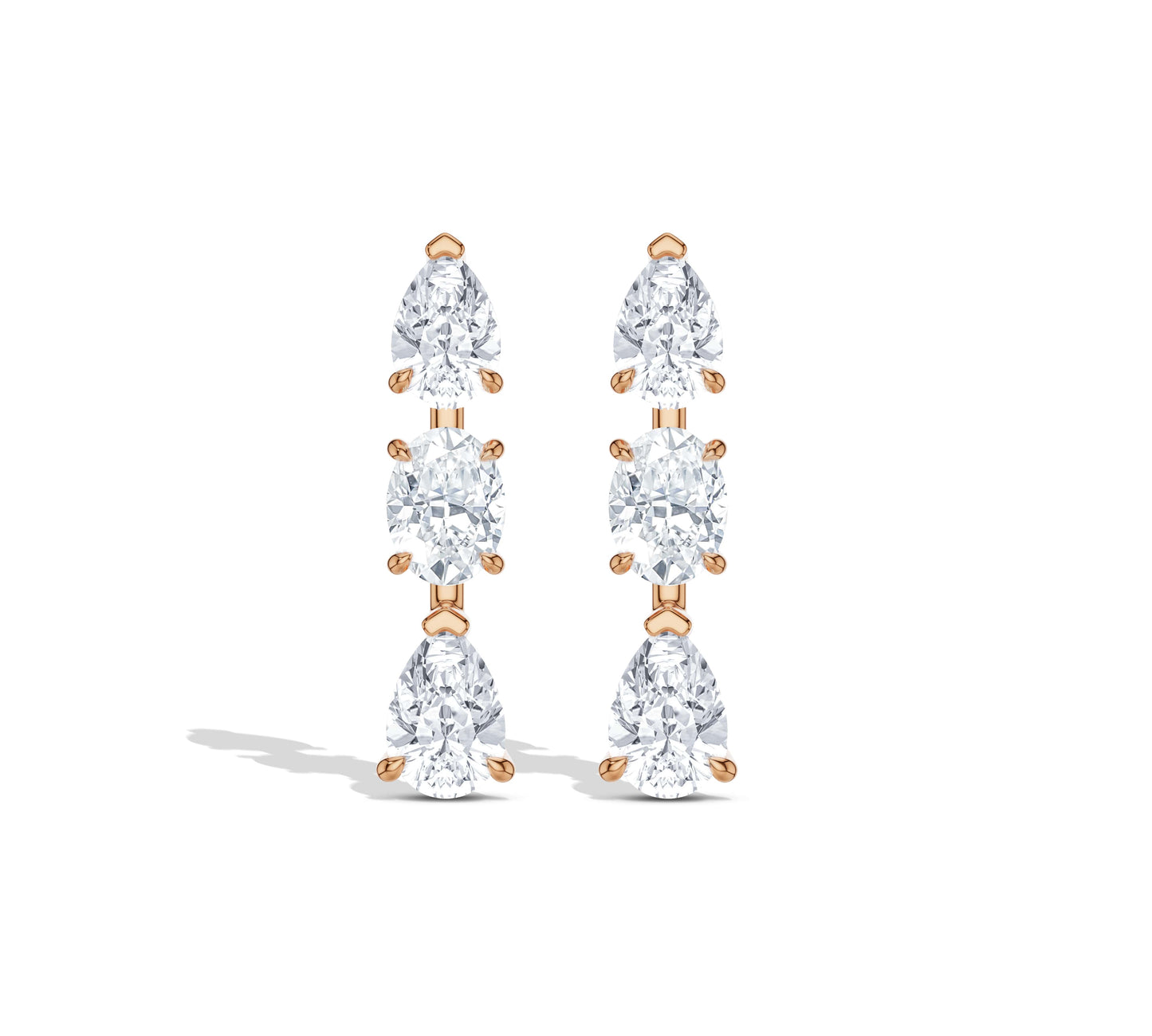 Long pear-cut and oval diamond earrings