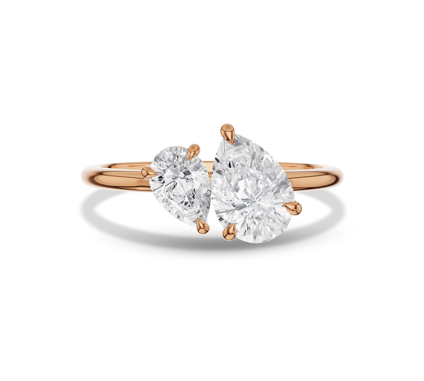 Rose gold asymmetrical pear Toi et Moi ring with moissanite