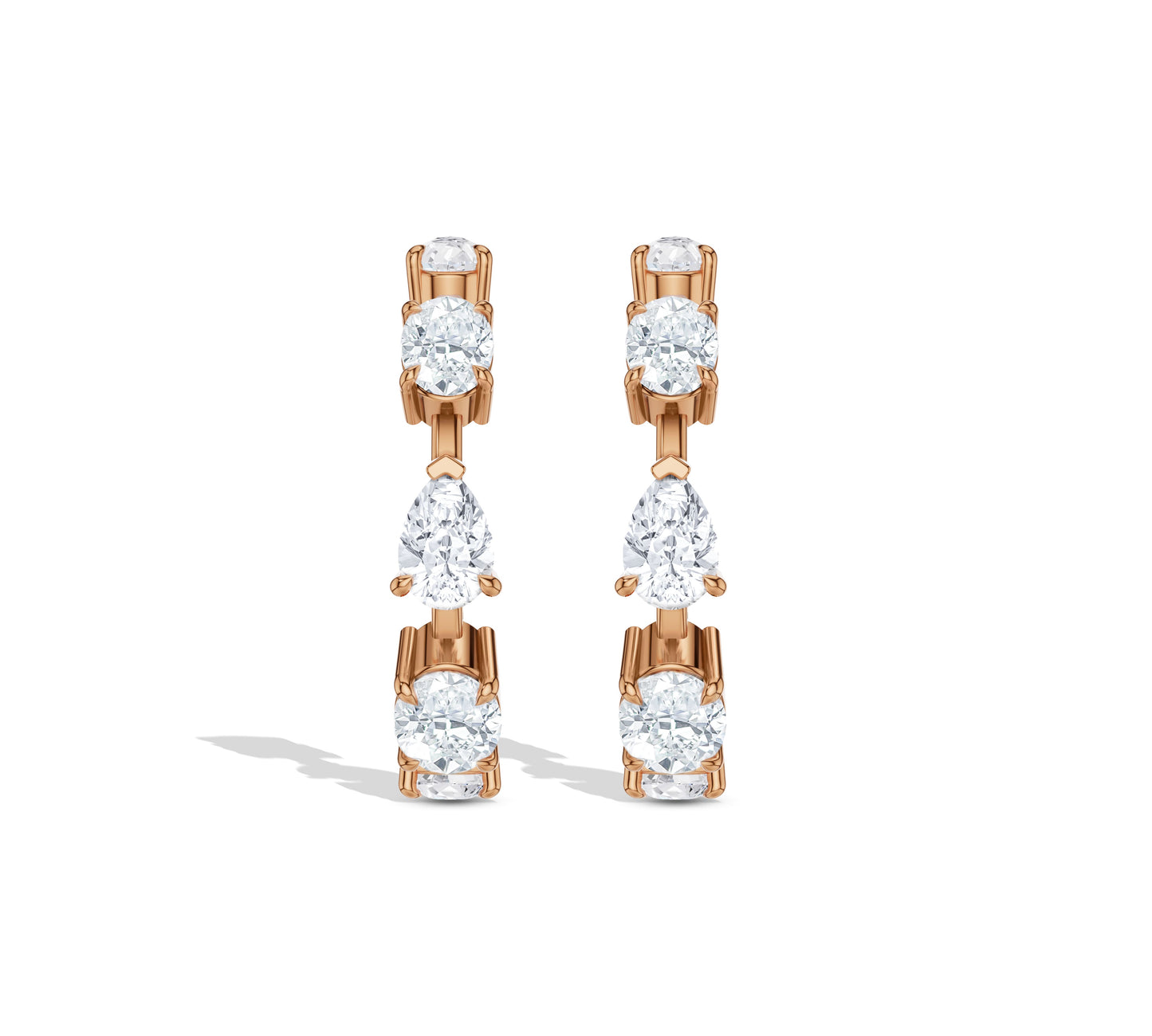 Glamorous pear and oval shaped diamonds in hoop design