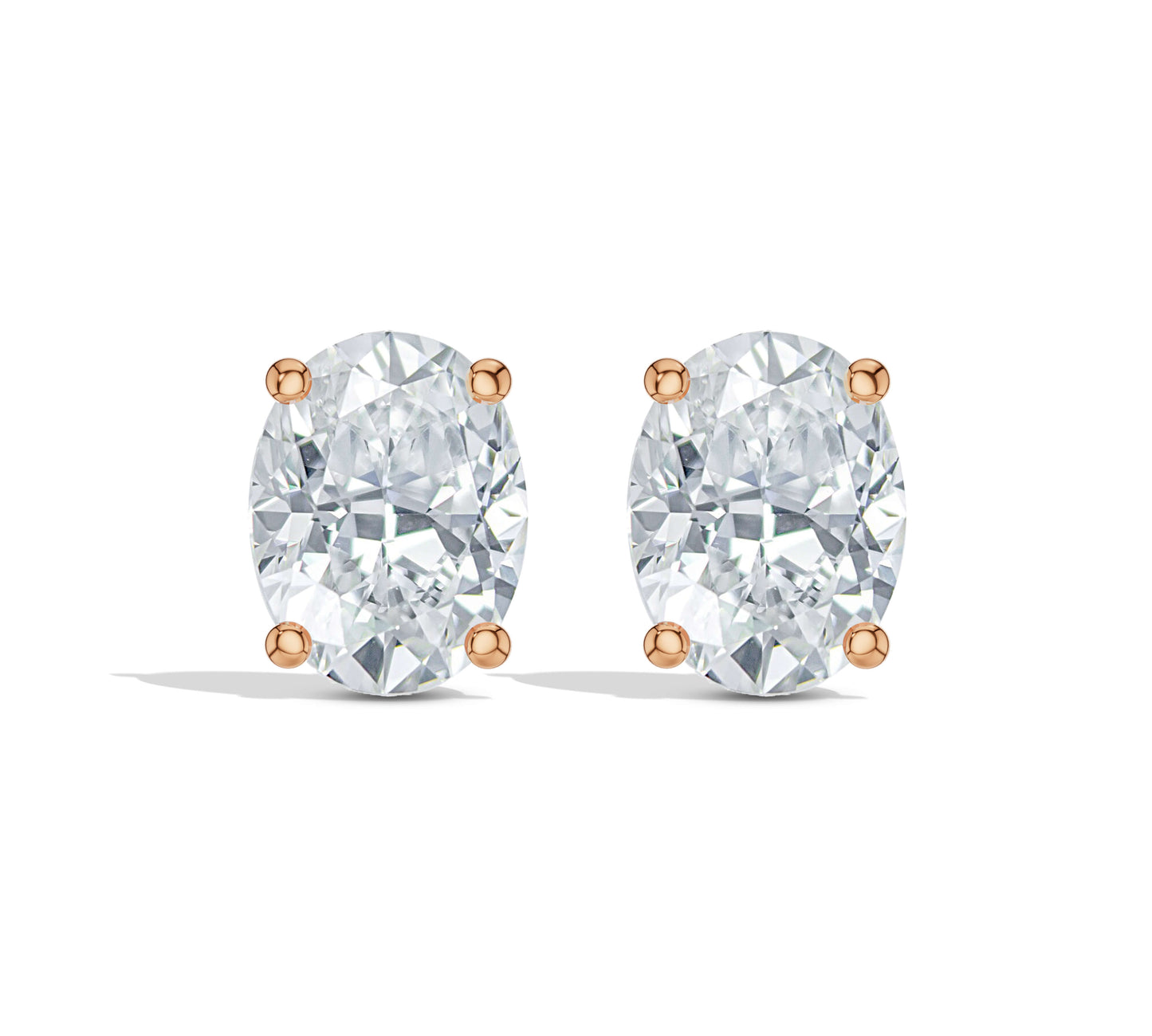 Solitaire diamond earrings in gold