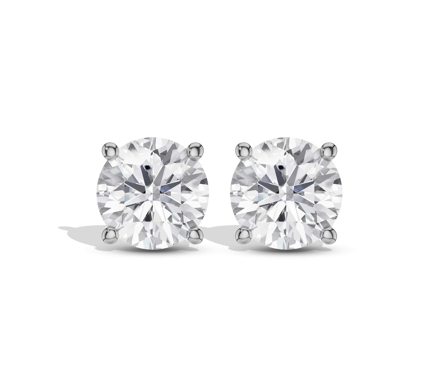 Round moissanite diamond earrings in classic four-prong setting