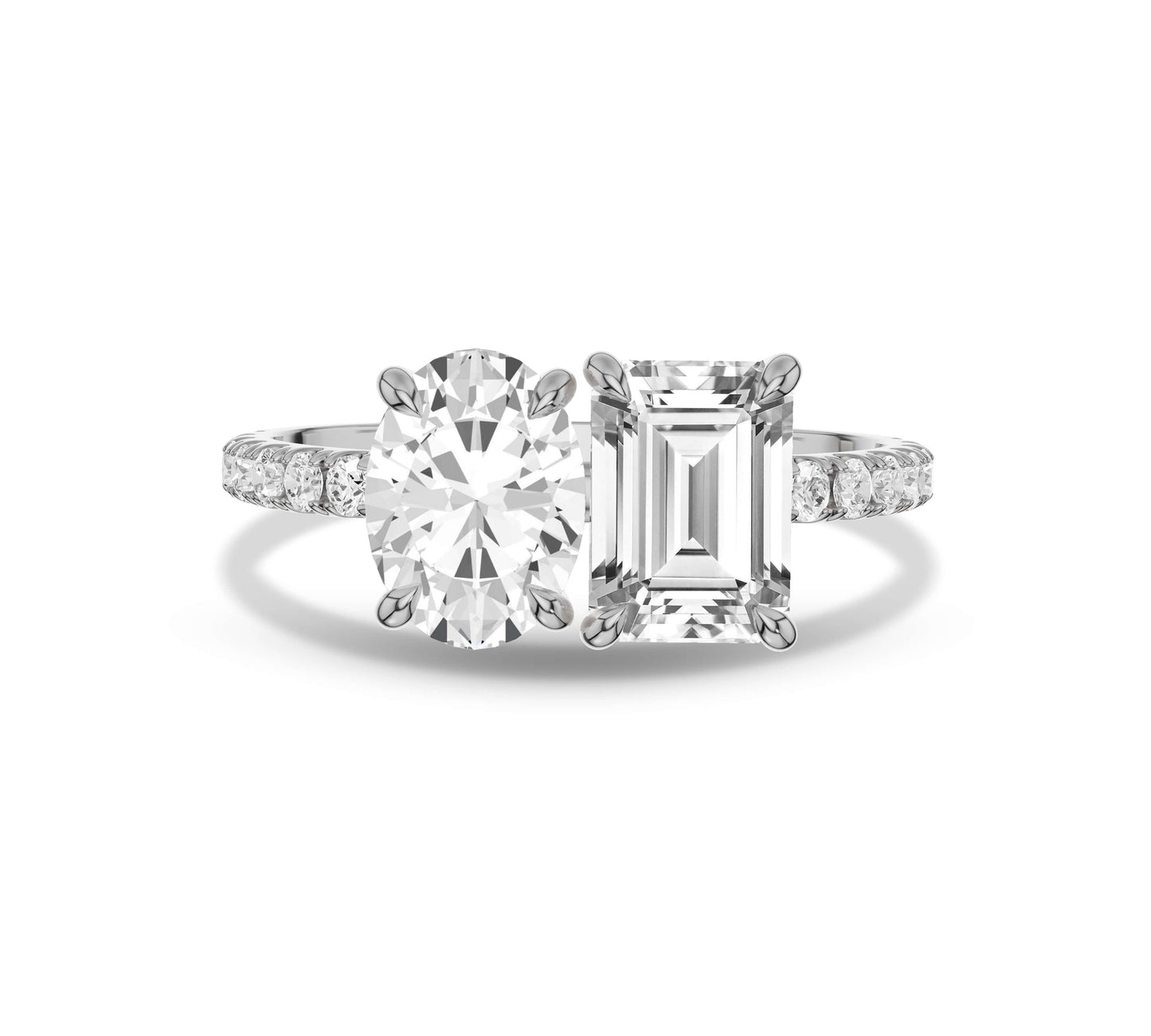 White gold Toi et Moi pave ring with lab grown emerald and oval diamonds