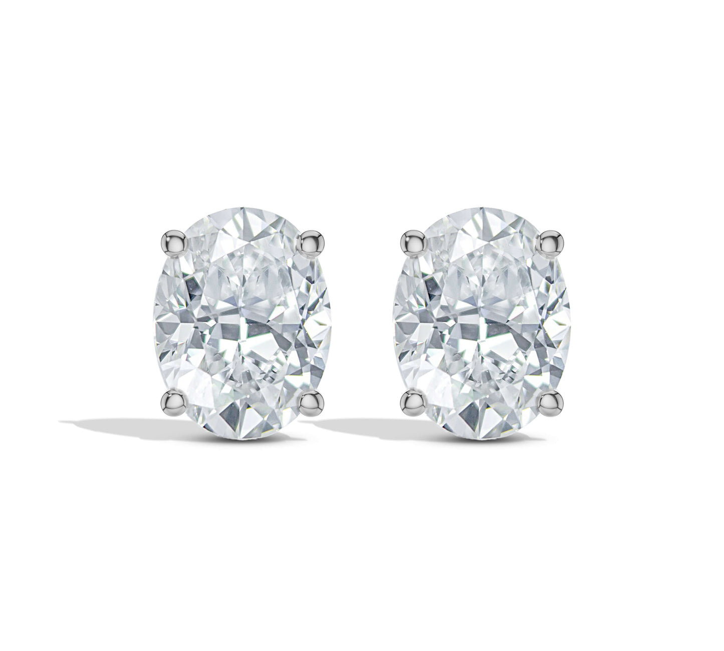 Four-prong white gold diamond studs