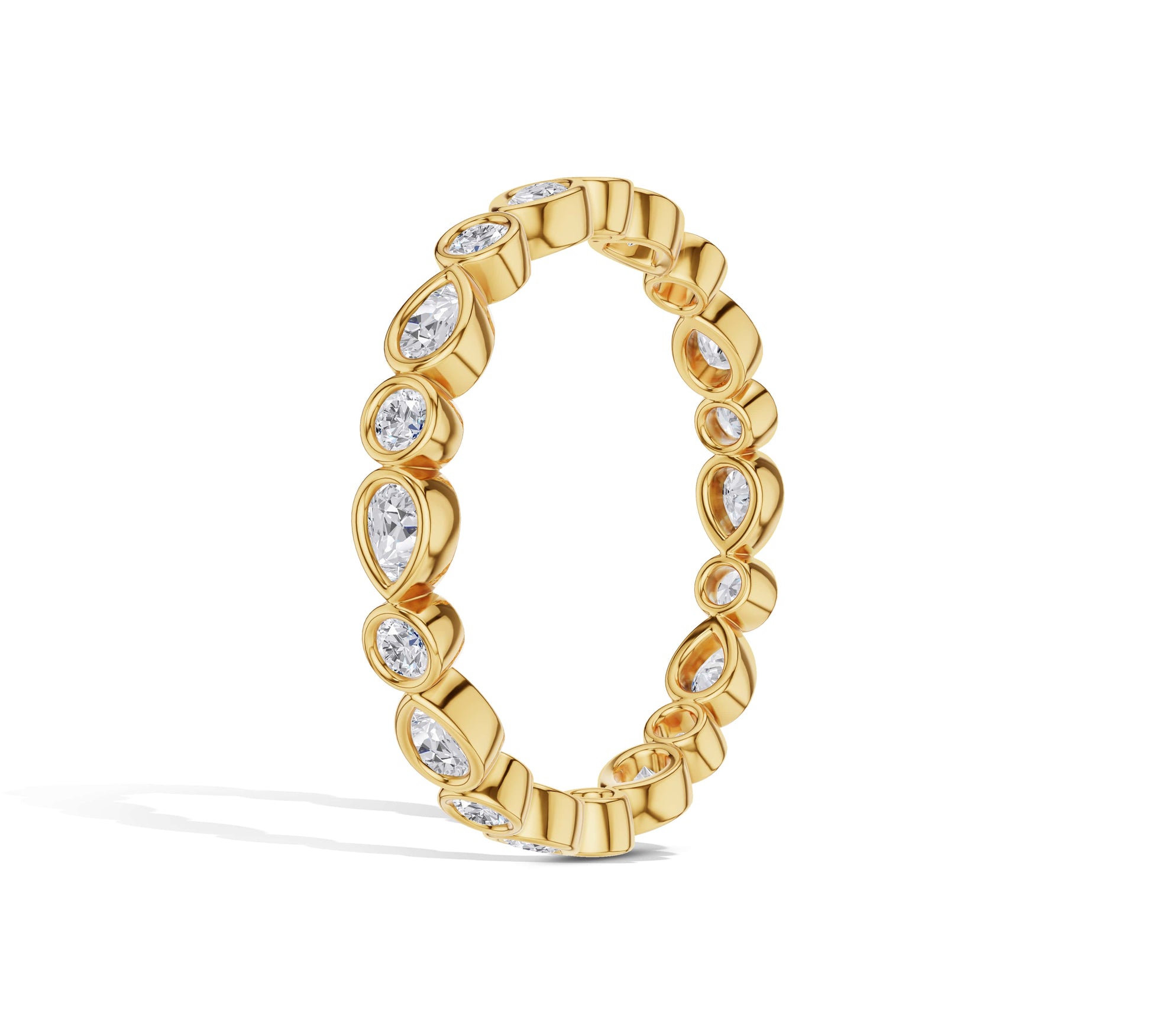 18K yellow gold pear and round diamond ring