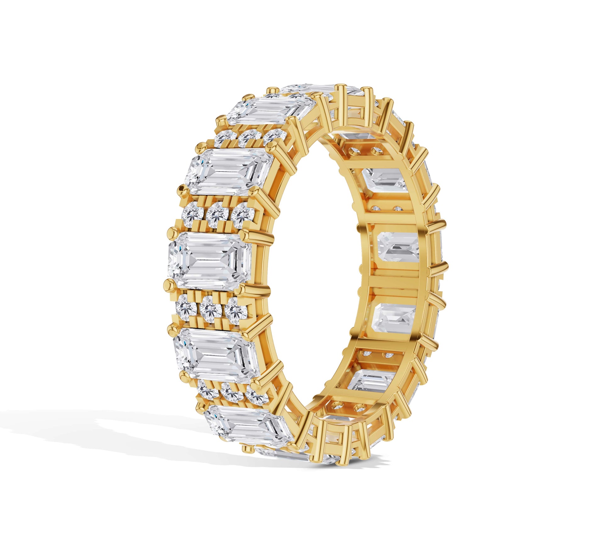 Bold eternity ring featuring alternating emerald and round brilliant diamonds