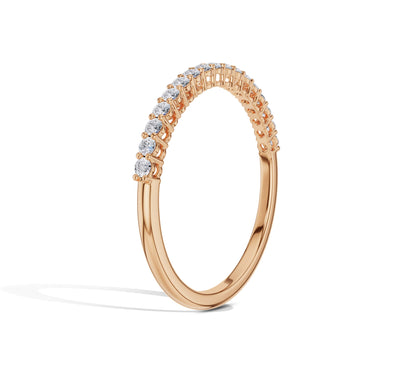 Thin yellow gold ring with sparkling white diamonds
