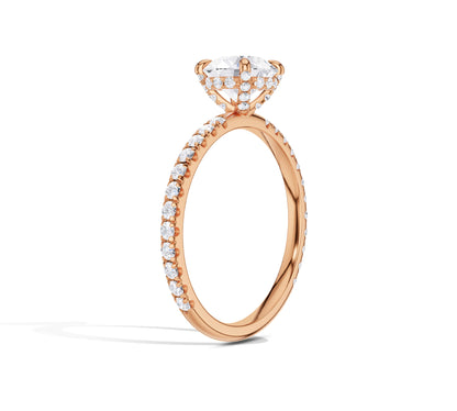 Side profile of solitaire engagement ring with sparkling details