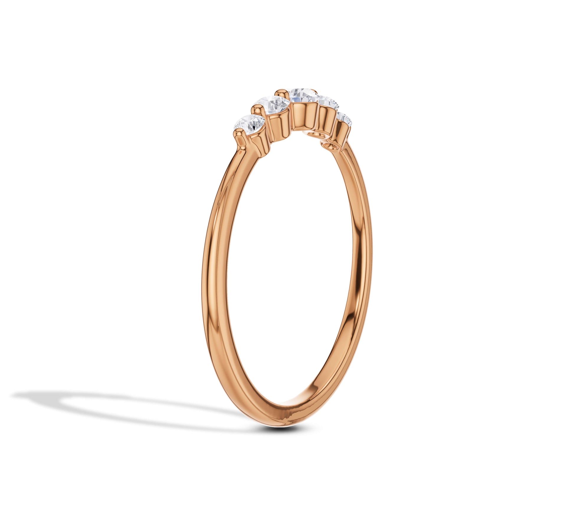 Subtle rose gold band with five lab grown diamonds