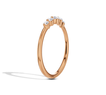 Subtle rose gold band with five lab grown diamonds