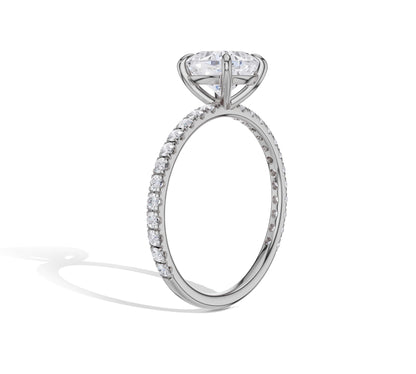 Elegant cushion solitaire in white gold setting
