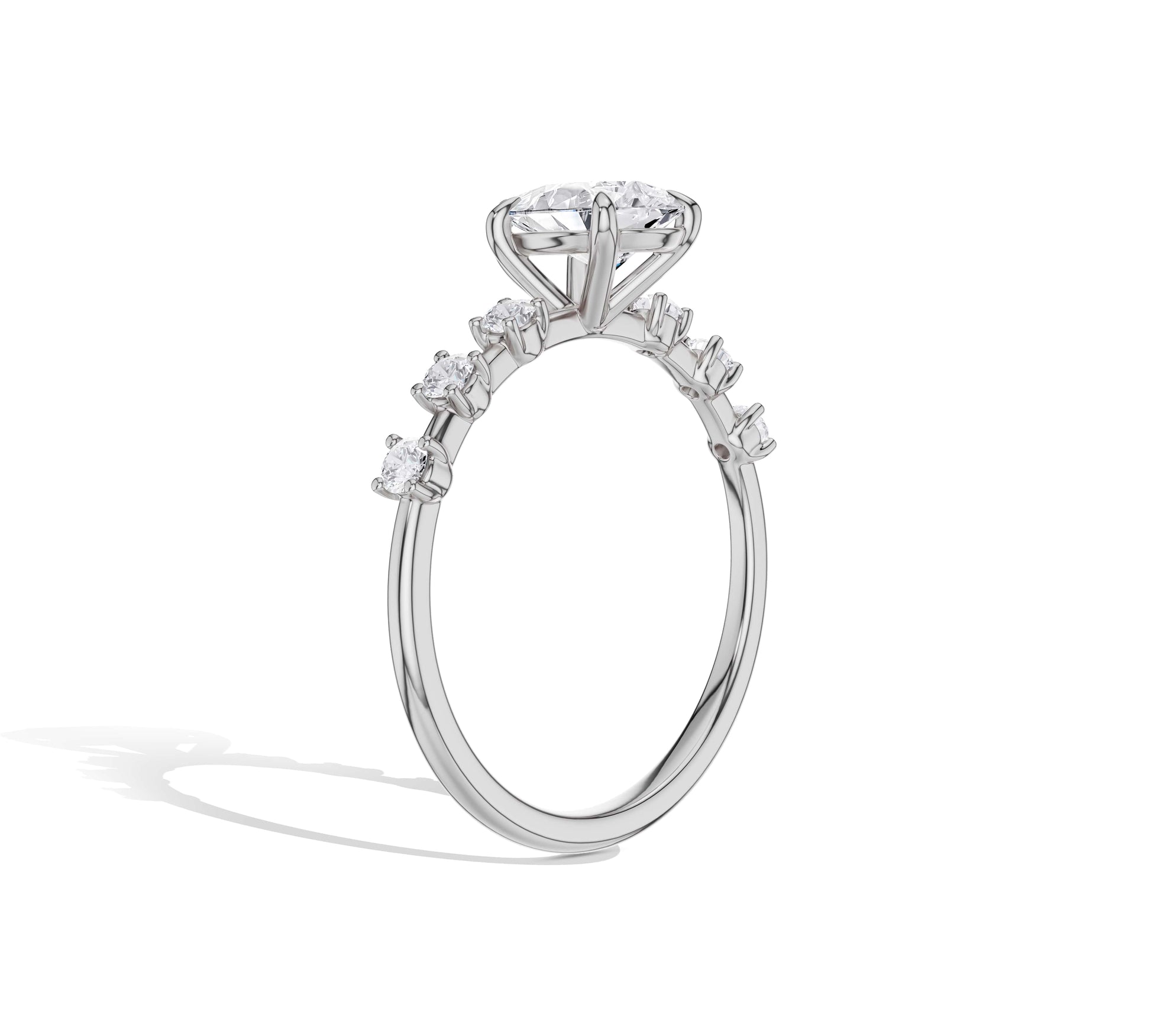 White gold teardrop diamond ring with side stones