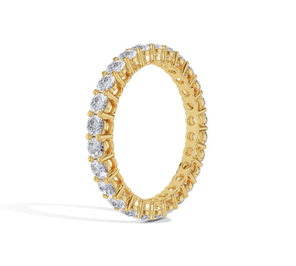 Diamond wedding band in classic yellow gold