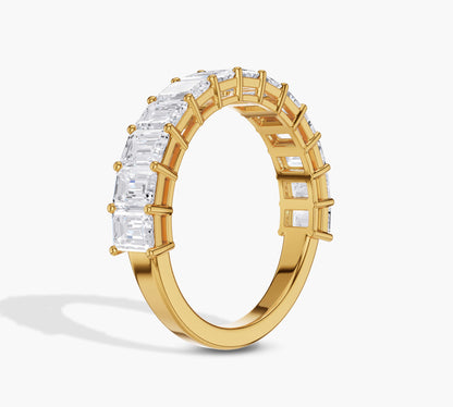 Sleek yellow gold emerald diamond ring