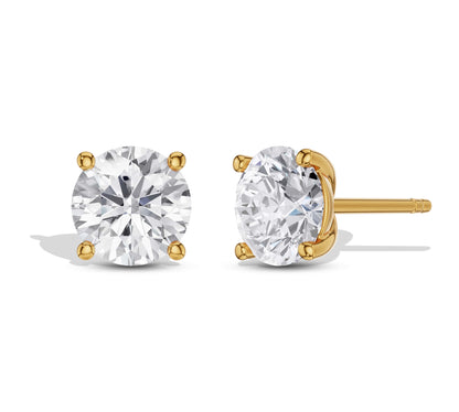Minimalist solitaire diamond studs on white background