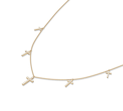 Dainty layered cross necklace in 14K gold