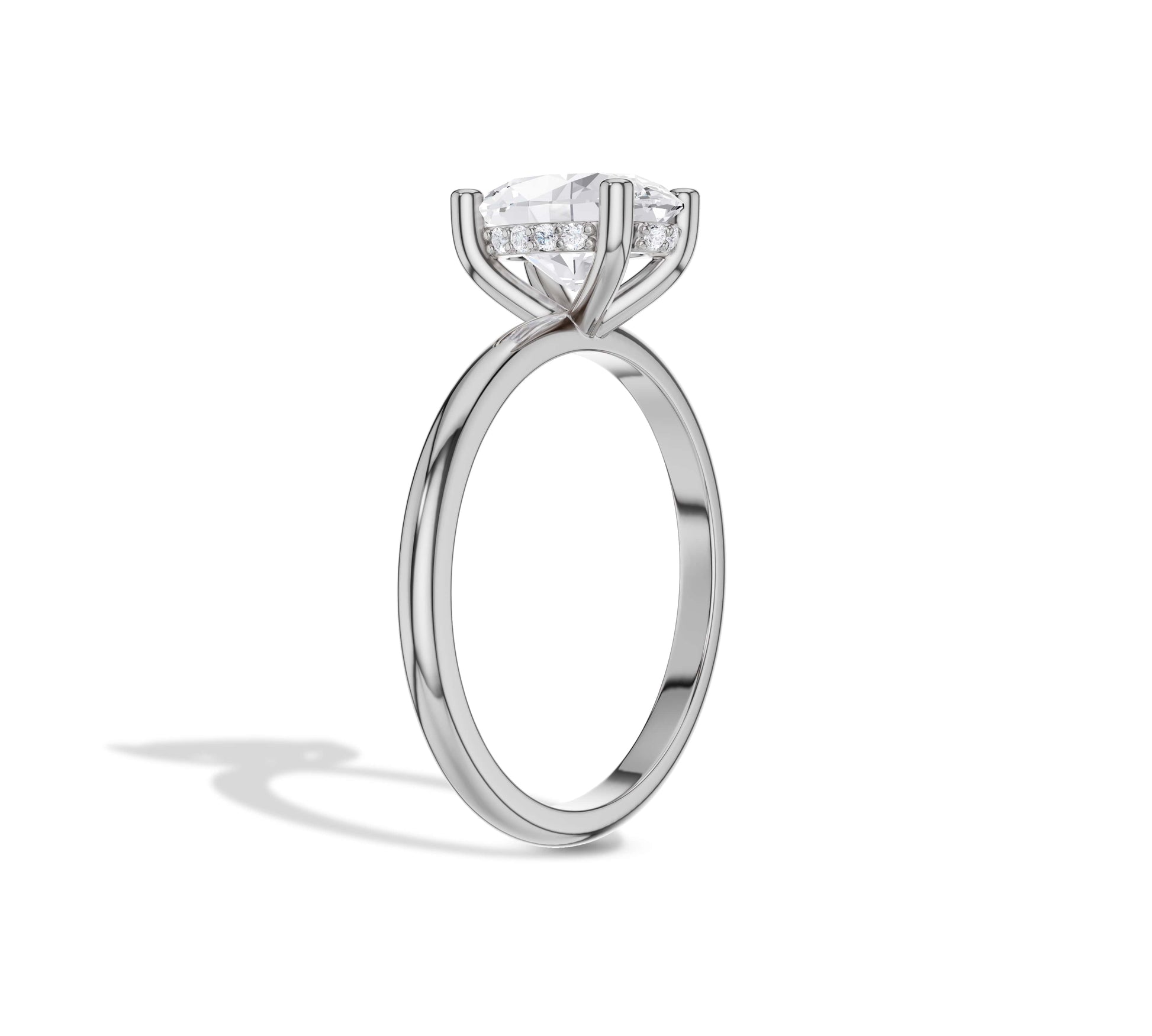 oval engagement ring in secret halo