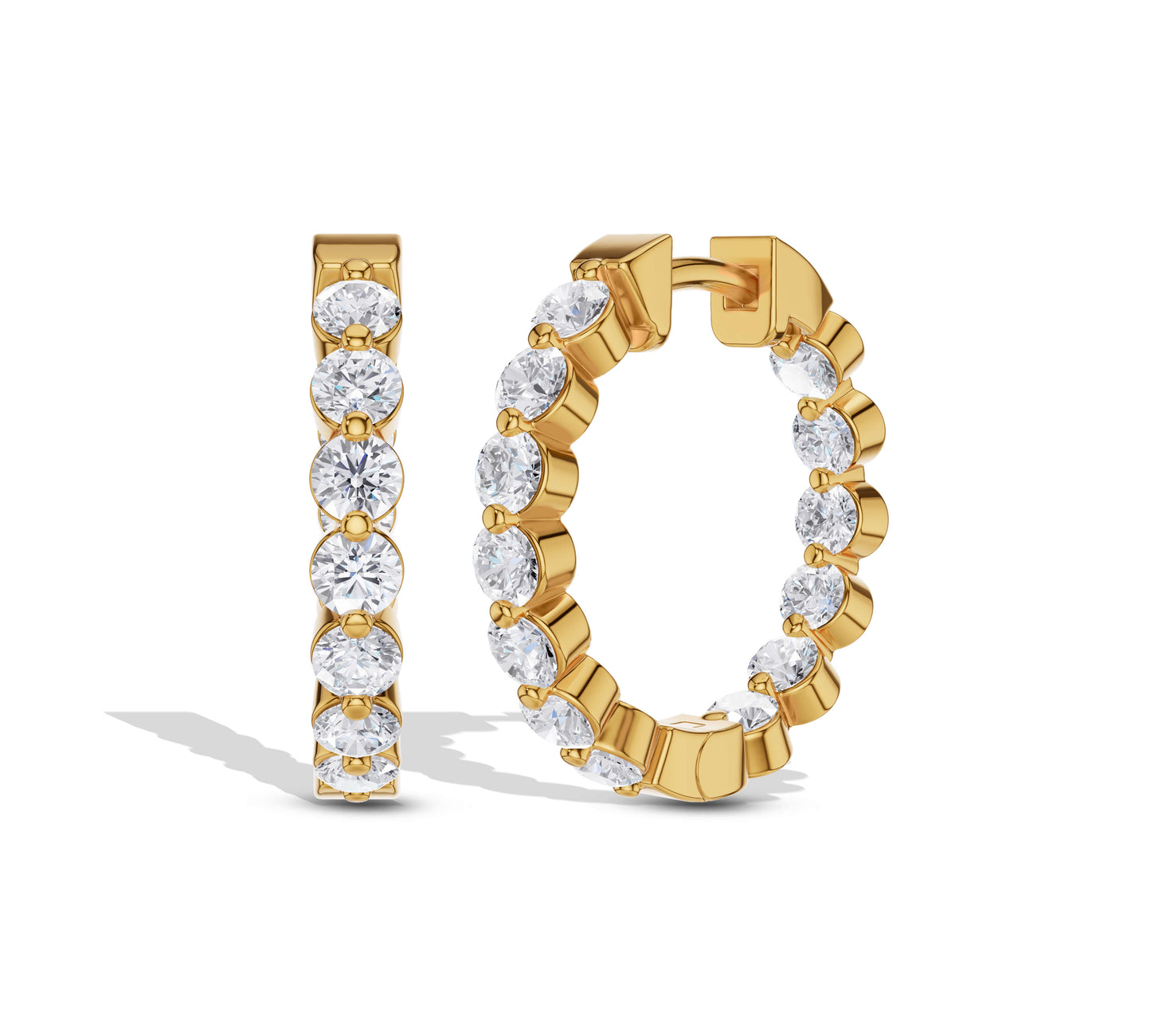 Yellow gold hoops featuring round moissanite diamonds
