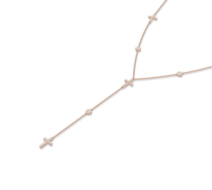 Dainty rose gold necklace with a diamond and cross drop