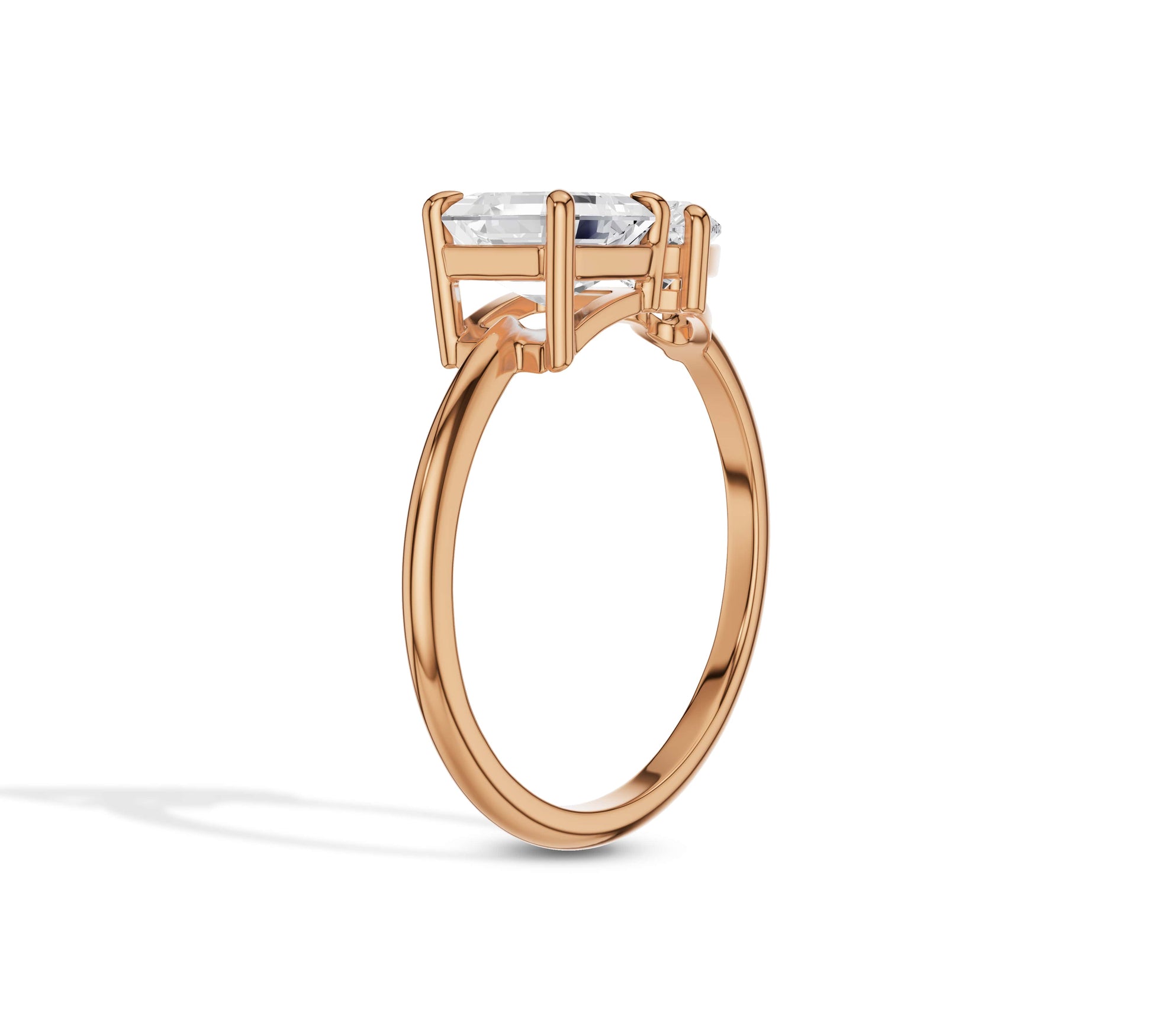 Unique rose gold ring with asscher and heart shaped diamonds