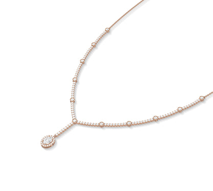 Oval drop diamond necklace with bezel set chain in yellow gold