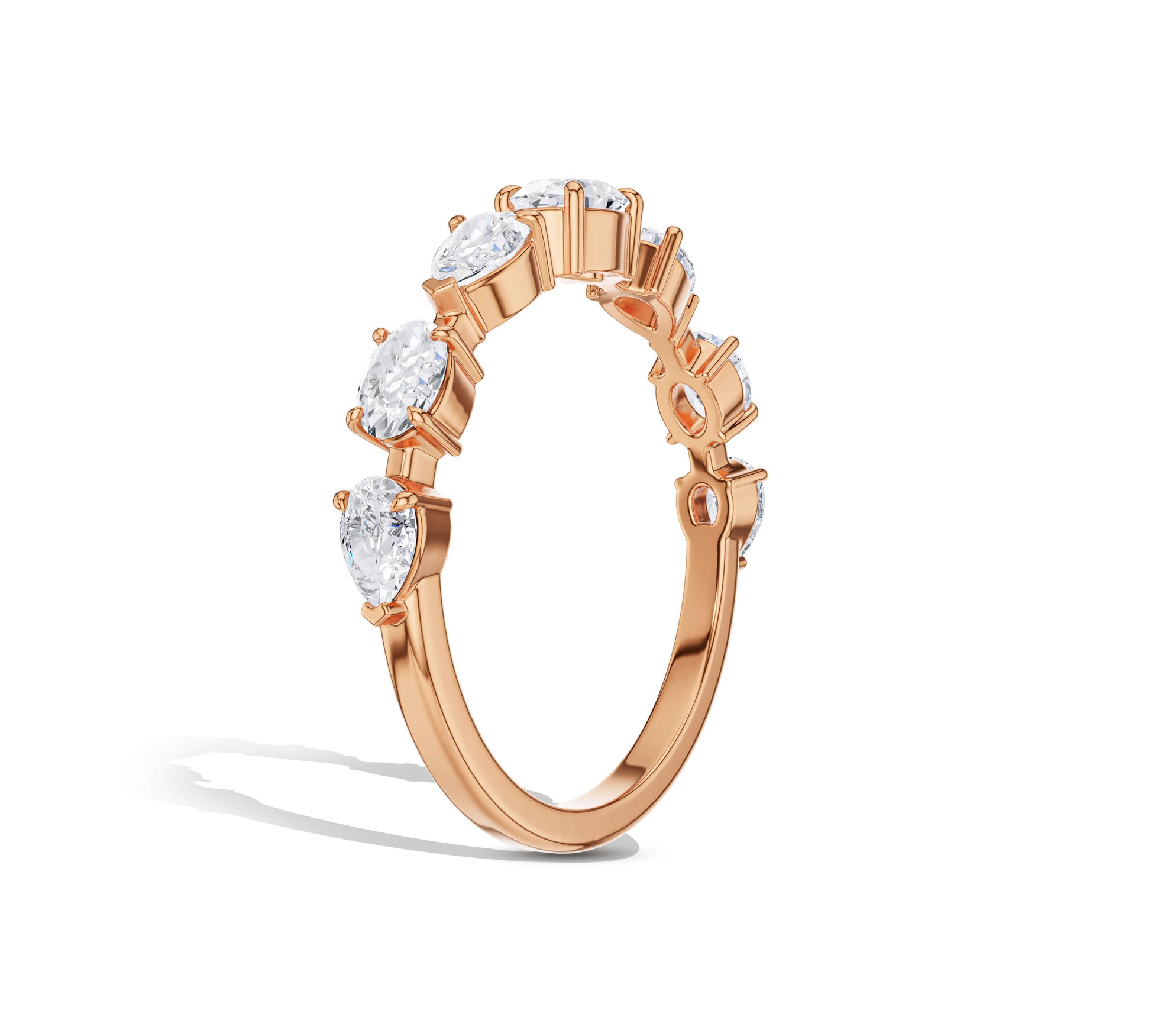 Gold band with mix of oval and round diamonds