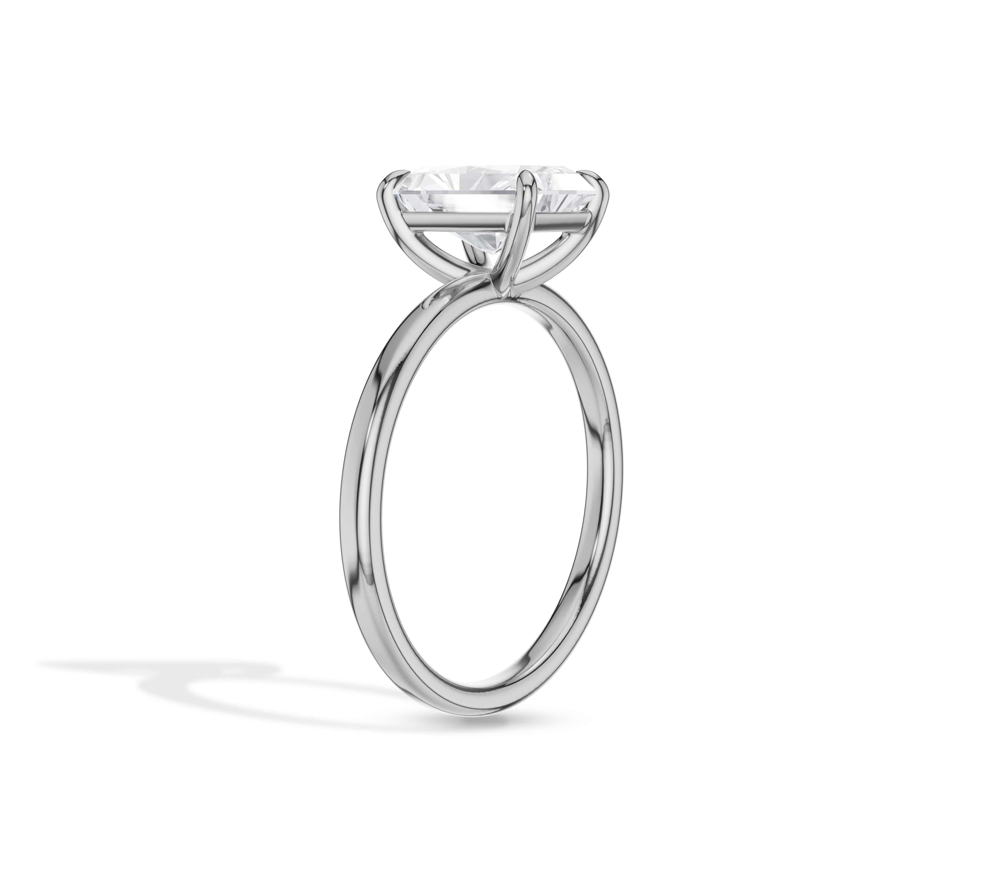 Smooth band highlighting radiant center diamond