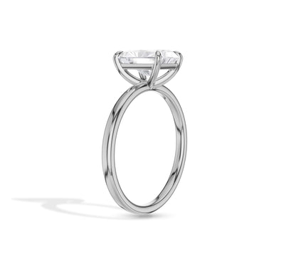 Smooth band highlighting radiant center diamond