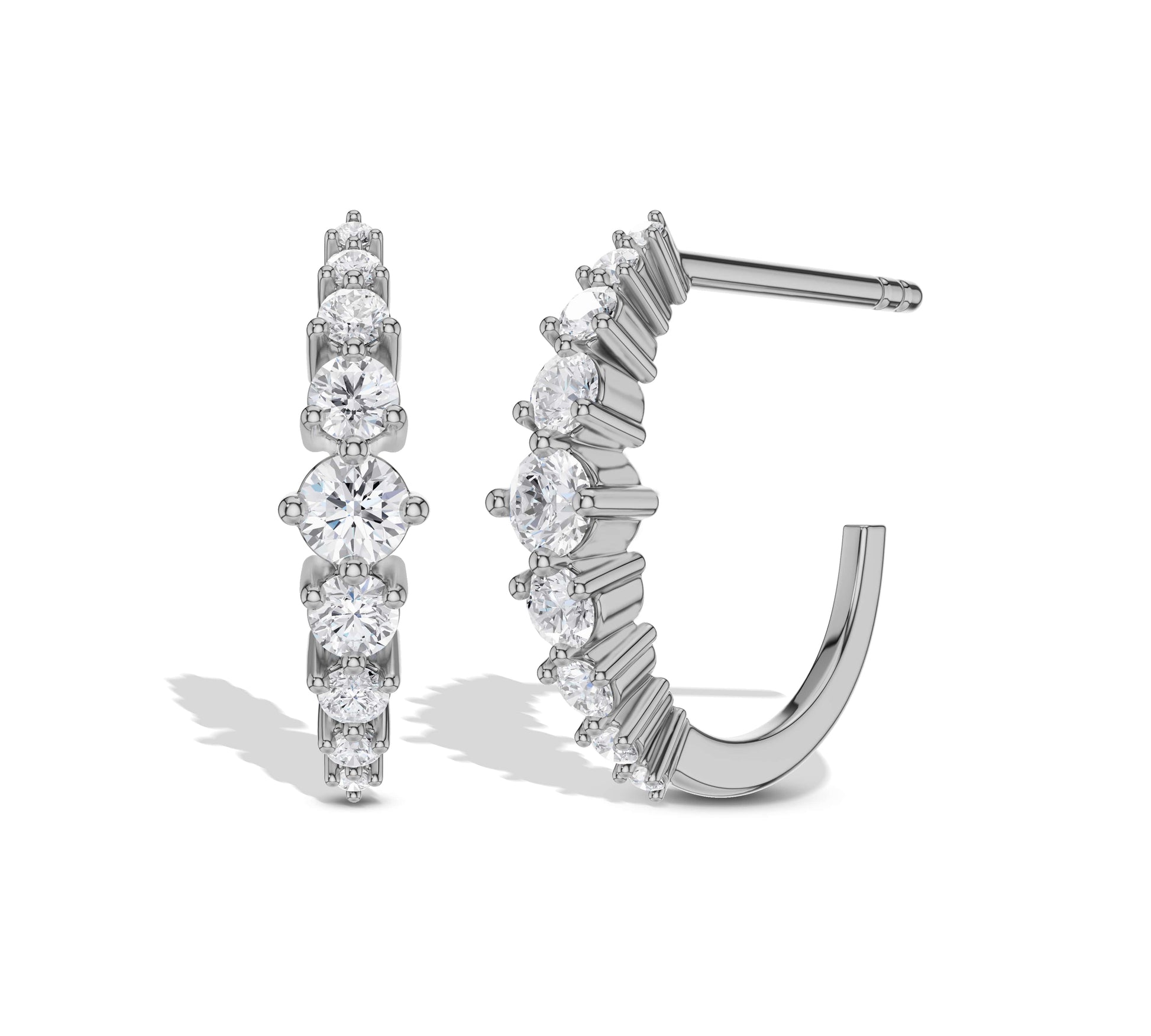 White gold diamond huggie earrings with moissanite