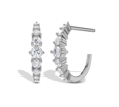 White gold diamond huggie earrings with moissanite