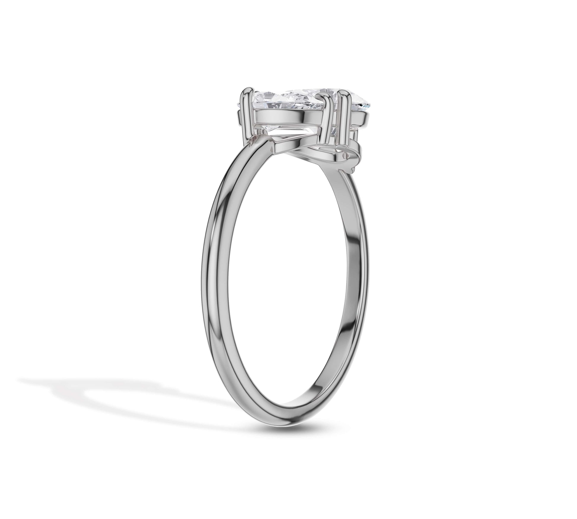 White gold dual pear shaped diamond ring