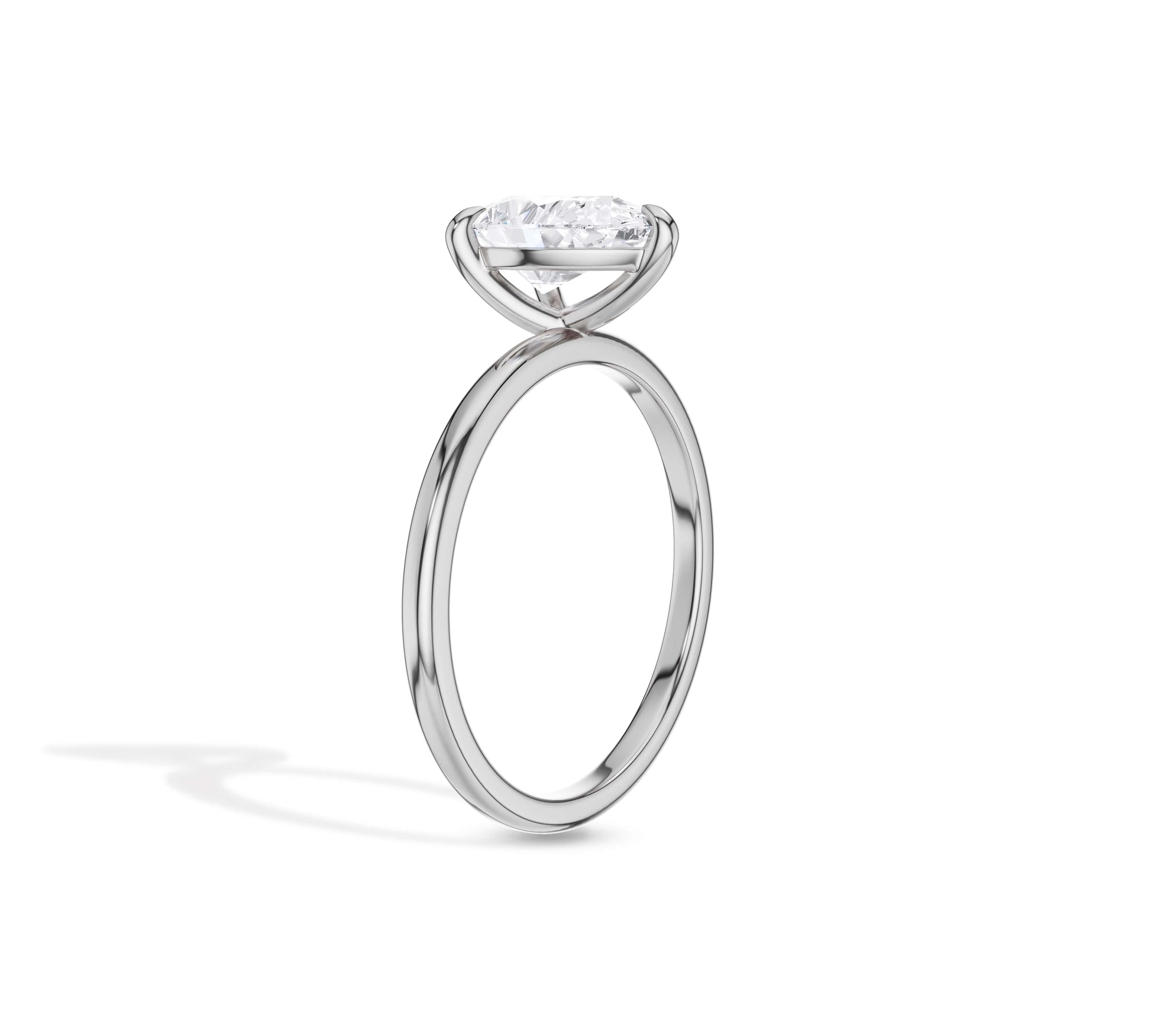 Classic white gold engagement ring with pear diamond