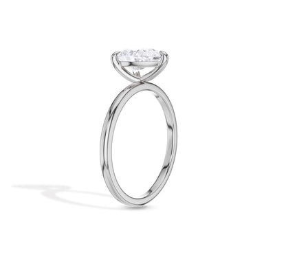 Classic white gold engagement ring with pear diamond