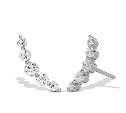 Trendy white gold diamond crawler earrings