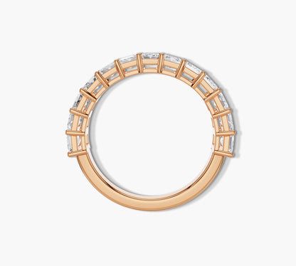 Luxury half eternity band with emerald diamonds