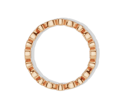 Romantic rose gold ring with pear and round diamonds
