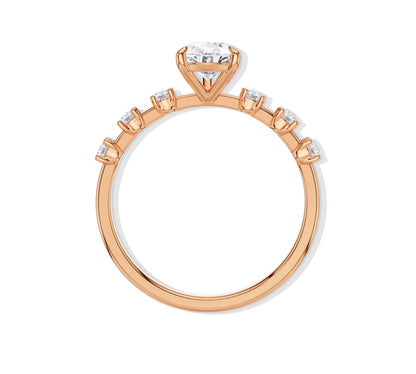 18K rose gold engagement ring with pear cut and accents