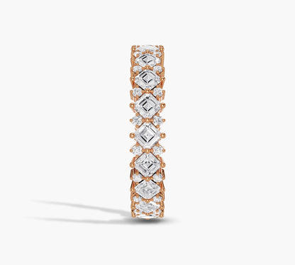 Alternating diamond shapes in full eternity ring