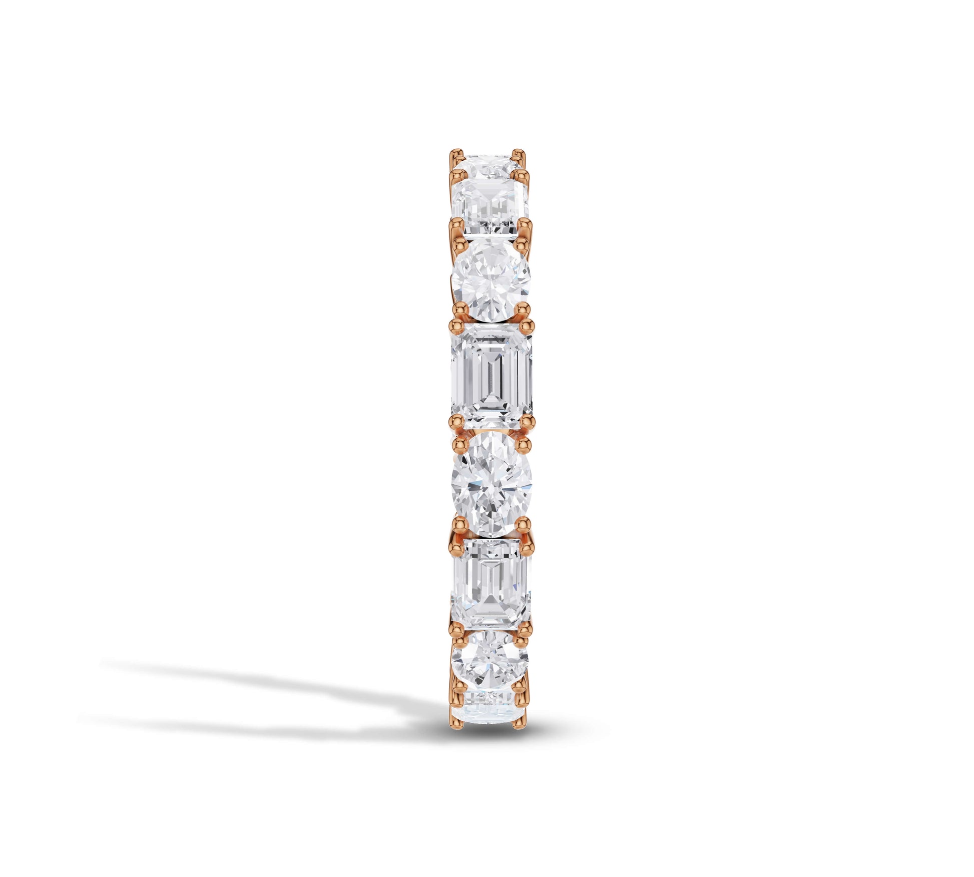 Artful mix of round and emerald diamonds