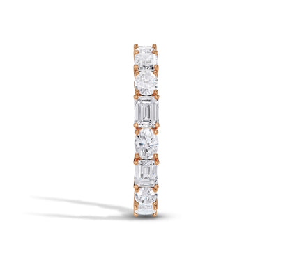 Artful mix of round and emerald diamonds