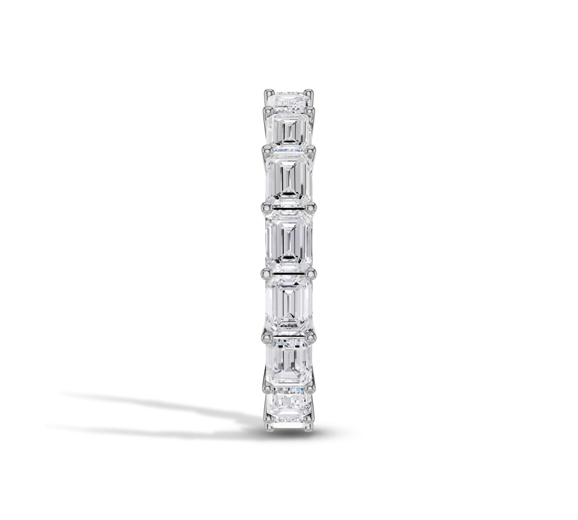 horizontal emerald diamond wedding band