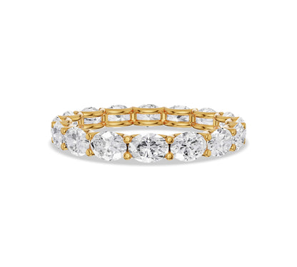 Yellow gold oval cut moissanite eternity band