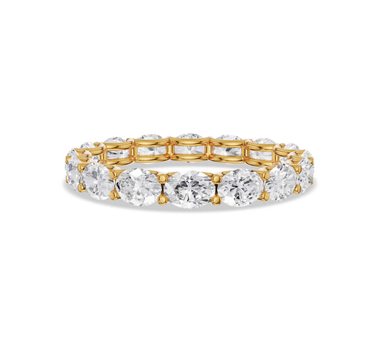 Yellow gold oval cut moissanite eternity band