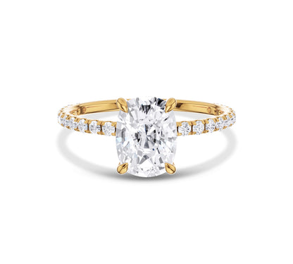 Yellow gold cushion cut moissanite engagement ring with pavé diamonds