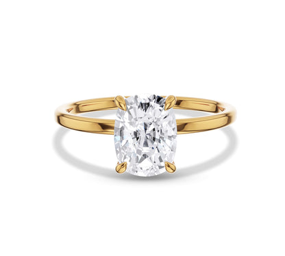 Yellow gold cushion cut solitaire moissanite engagement rin
