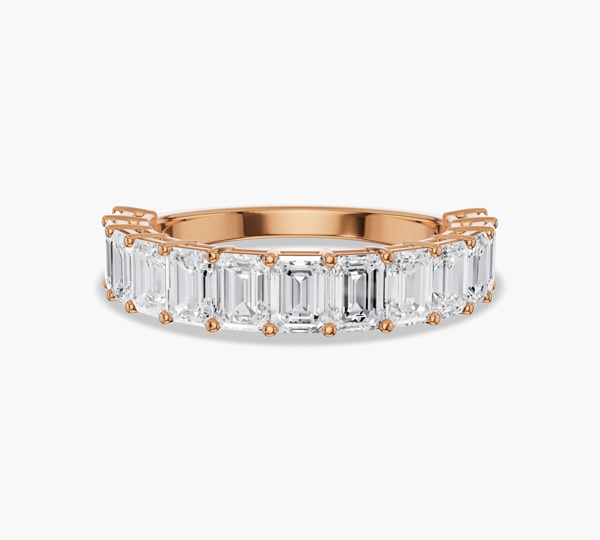 Emerald cut wedding band in yellow gold